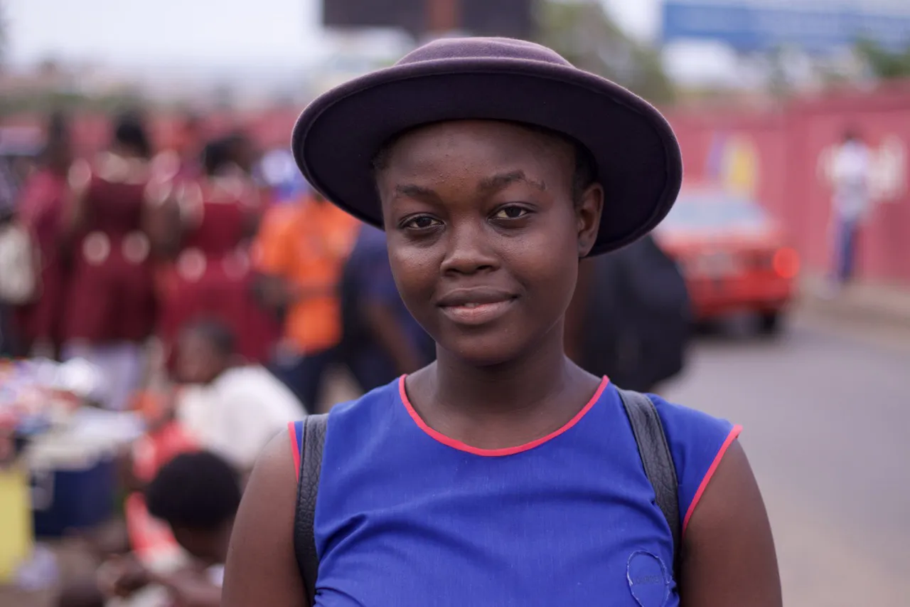 Dark skin girl with hat atSalone Tech Nation Campus